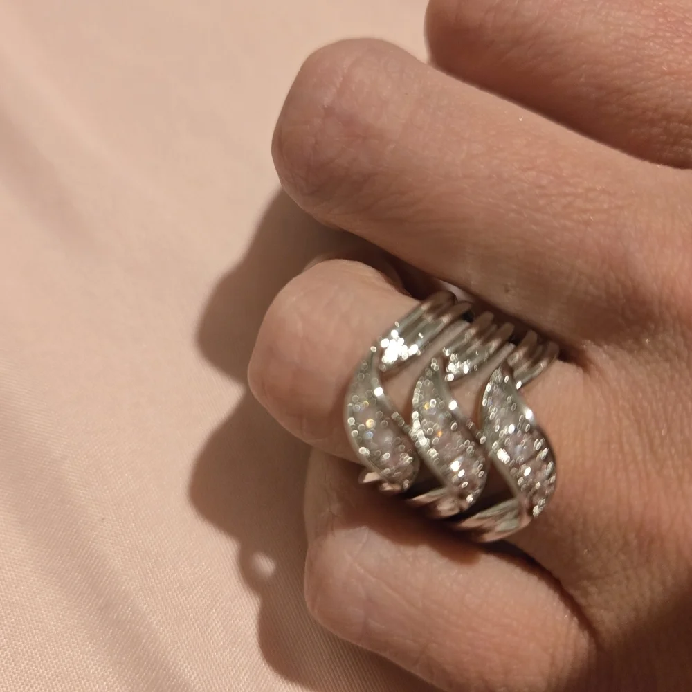 Silver and White Twisting Diamond Ring